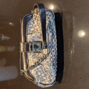 The Sak bronze woven satin baguette with faux bronze patent leather